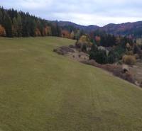 A landscape with a meadow and forests in the Recreational Grounds, Čertov, Lazy pod Makytou, in autumn colors.