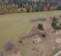 A meadow surrounded by forests in the Recreational Grounds, Lazy pod Makytou, Čertov with an autumn scenery.