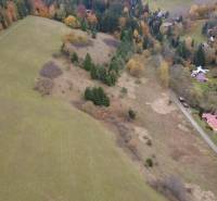 Aerial view of recreational plots in Čertov, Lazy pod Makytou, surrounded by nature and forests.