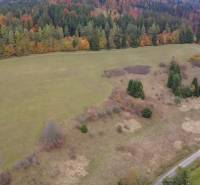 Aerial view of recreational plots near Lazy pod Makytou on Čertov Street with a forest environment.