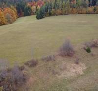 Autumn scenery of recreational grounds in Lazy pod Makytou, Čertov, with colorful trees on the horizon.