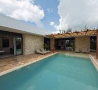 Construction of houses in Paje, Unguja South Region with a pool and stone walls on the terrace.
