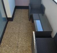 Balcony with seating in a 2-room apartment on Predmerského Street in Trenčín.