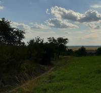 Natural scenery at the Recreational Grounds near Horné Jabloňovce with sky and trees.