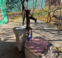 Water pump in the gardens on Stredná Street in Bratislava - Ružinov during autumn.