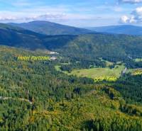 Aerial view of the forest around the Cottage in the village of Bystrá on Tále Street.