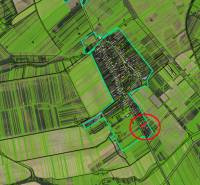 Aerial map focusing on residential plots in Radnovce, visible fields and roads.