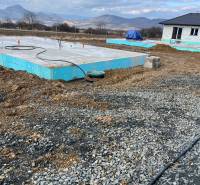 The building on Vyšná Šebastová Street shows the foundations of a family house in a picturesque setting.