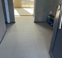 A hallway in a family house with underfloor heating, overlooking Vyšná Šebastová Street.
