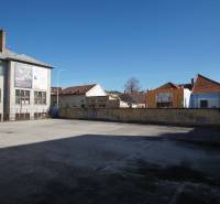 Spacious plot for living in the center of Nové Zámky with surrounding historical buildings.