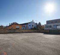 Sunny plots in Nové Zámky with views of the surrounding buildings suitable for living.