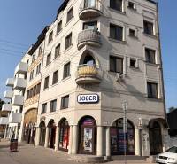 A building with commercial spaces on Petőfi Street in Komárno with interesting balconies.