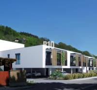Low modern buildings with wooden elements on Dolná Street in Žilina.