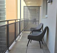 Balcony of a 2-room apartment, Bratislava - Staré Mesto, Bezručova, with seating and metal railing.