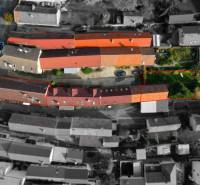 A view from above of family houses and gardens on Alstrova Street in Bratislava - Rača.