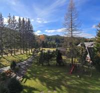Garden and forest view from a 3-room apartment in Donovaly Spiežovec in Donovaly.
