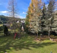 Garden in Donovaly at Donovaly Spiežovec with a children's playground and natural surroundings.