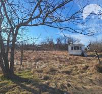 Natural lands with a caravan in Radvaň nad Dunajom, Agricultural and forest lands.