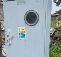Electrical cabinet near residential plots in Iža, suitable for infrastructure.