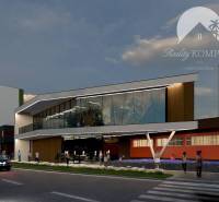 In the picture is a modern building in a night city with people, plots, housing.