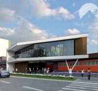 Modern building with a glass facade and pedestrians in an urban environment. Real estate - housing.