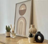 Decoration on a sideboard with a wood decor in a studio apartment, elegantly arranged.