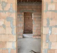 Brick construction inside a family house, undergoing renovation.