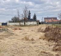 Building plot in Zlatná na Ostrove with a view of the neighboring family house.