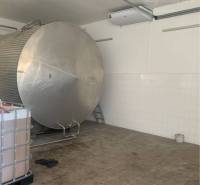 Interior of warehouses and halls with a stainless steel tank and wall cladding.