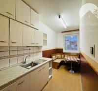 The kitchen of a 3-room apartment with corner seating and a kitchen unit.