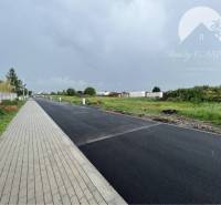 Asphalt road and sidewalk at Bučuháza in Šamorín, Land - housing.