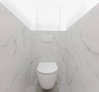 A toilet with marble tiles in a 3-room apartment with LED lighting.