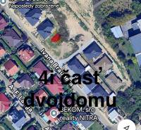 An aerial photograph of the location on I. Braunera Street in Nitra shows family houses and surrounding plots.