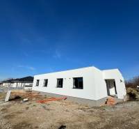 A family house in Nitra on I. Braunera Street in the construction phase with a white facade.