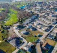 An aerial view of the Hrubá Borša area, combining a golf course with residential plots.