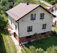 A family house at Dúbravská 58 in Prešov with a beautiful garden and a sloped roof.