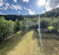 The garden at the family house on Dúbravská 58 in Prešov, with a greenhouse and fruit trees.