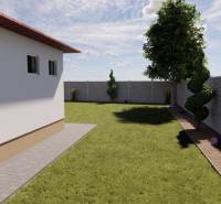A view of the courtyard of a family house in Zemianska Olča with landscaped greenery and a walkway.