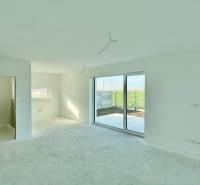 Living room with large windows and a view in a family house.