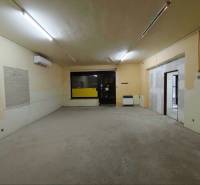 A spacious room in a family house with lighting and air conditioning.