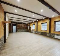 Interior of a family house with a wooden decor floor and wooden walls.