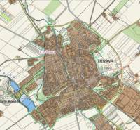 The map of Trnava shows agricultural and forest lands with a road network and water bodies.