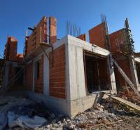 A recreational apartment in Vodice under construction, with exposed brick walls.