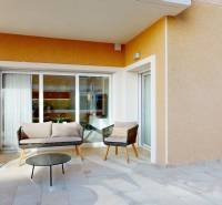 Terrace in a holiday apartment in El Raso with comfortable seating and a table.