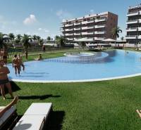 A holiday apartment in El Raso with a pool surrounded by palm trees and relaxing people.