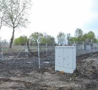 Building plot on Nad potokom street in Zohor, fenced with wire mesh.