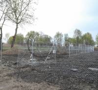 Building plot fenced with a wire fence in Zohor on Nad potokom street.
