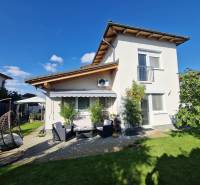 A family house in Piešťany on Jachtárska Street with a garden and terrace seating.