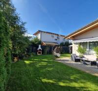 A family house on Jachtárska Street in Piešťany with a garden seating area and a grill.