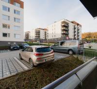 Parking lot on Liptovská Street in Trenčín, surrounded by 2 or more-story apartment buildings.